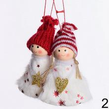 Súprava dvoch plastových anjelikov s rôznymi čiapkami.