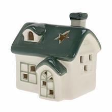 Porcelánový domček na sviečku v bielej a zelenej farbe.