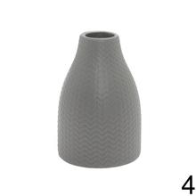 Keramická váza v mixe farieb, výška 14 cm.