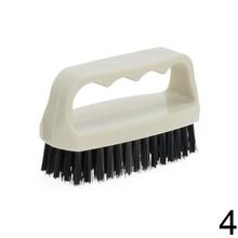 Ručná kefa v štyroch farbách.