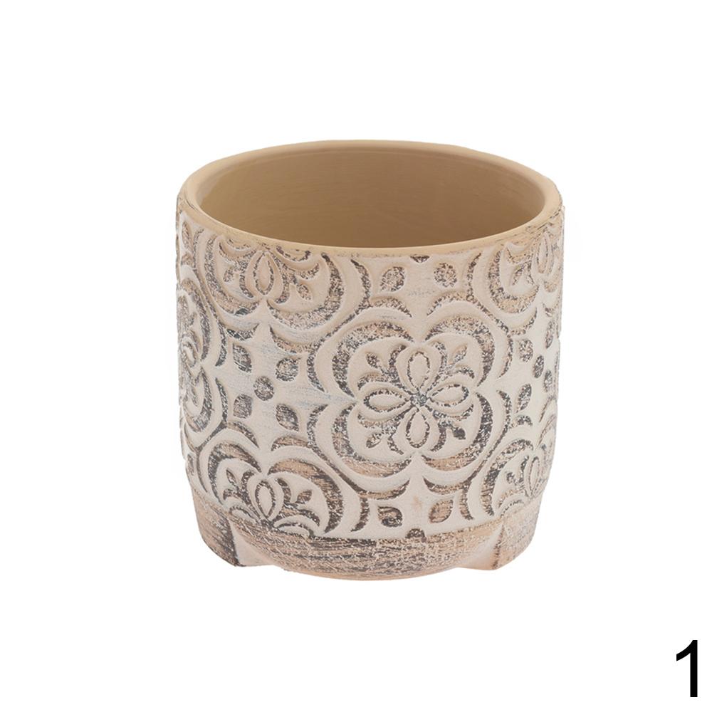Keramický květináč s dekorativním vzorem v terakotové a krémové barvě.