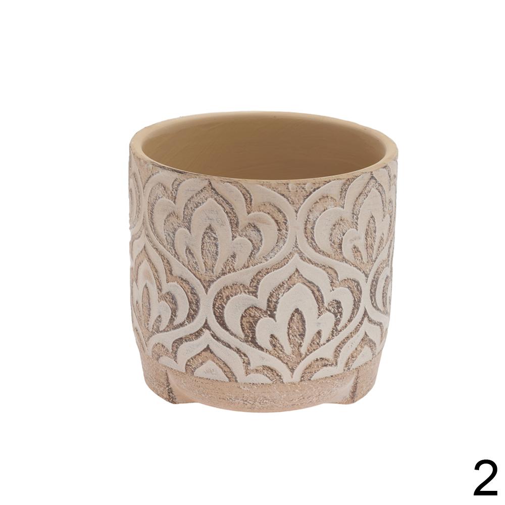Keramický květináč s dekorativním vzorem v terakotové a krémové barvě.