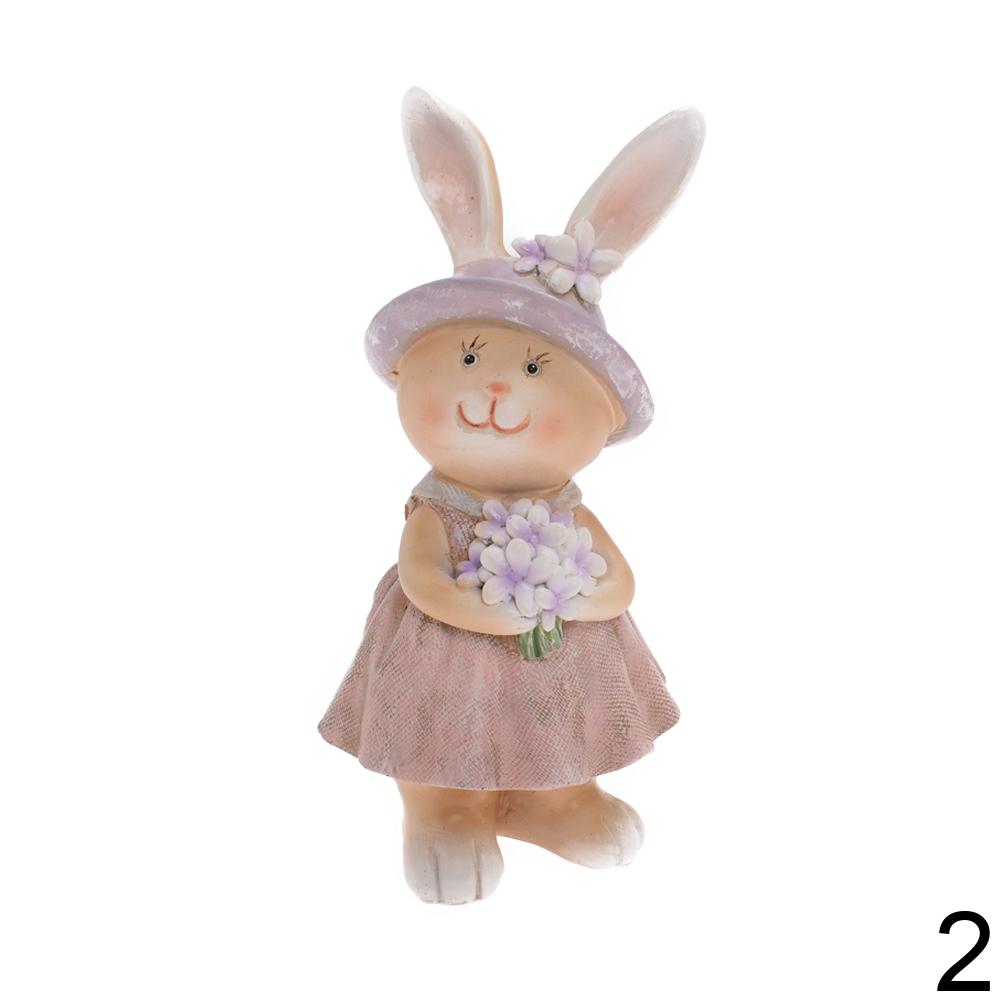 Hnědo-fialová směs zajíčků s kloboukem a květinou.