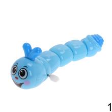 Modrý červík na kľúčik s usmievavou tvárou.