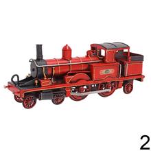 Model vlaku v červenej a zelenej farbe.