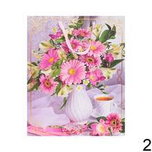 Darčeková taška s kvetinovým motívom.