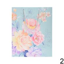 Darčeková taška s kvetinovým vzorom a trblietkami.