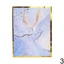 Darčeková taška M s rôznymi vzormi v pastelových farbách.