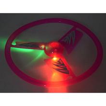 Lietajúci disk so svetelným efektom v rôznych farbách.