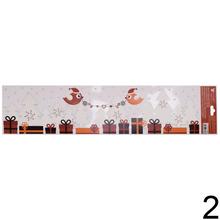 Vianočná fólia na okná s vtáčikmi a darčekmi.