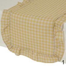 Obrus polyes volán v troch farbách: ružová, zelená a žltá.