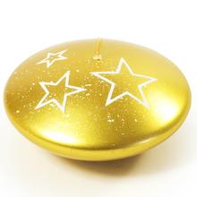 Bílé hvězdy na zlaté svíčce