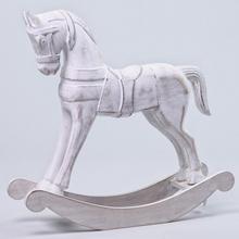 Bílý houpací koník