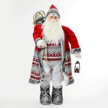 Vánoční Santa Claus v červeném oblečení s lampášem.
