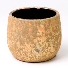 Zlatý kulatý obal Clemente na květináče.