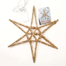 Zlatá vánoční hvězda s 20 LED světly.