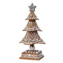 Dekorativní perníkový stromeček s hvězdou na vrcholu.