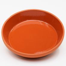 Glazovaná miska o průměru 29 cm v oranžové barvě.