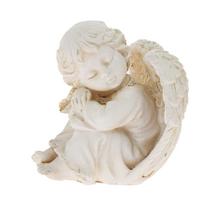 Bílý smuteční anděl na podstavci.