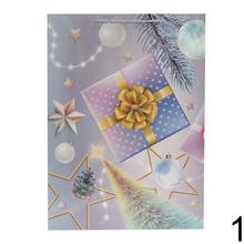 Dárková taška s vánočním motivem a glitry.