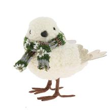 Bílý ptáček se zeleným šálkem.