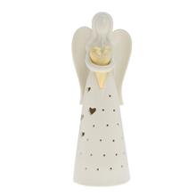 Bílý porcelánový anděl se zlatým srdcem.