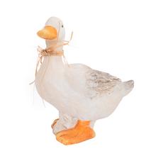 Keramická kachna s oranžovým zobákem a nožičkami.