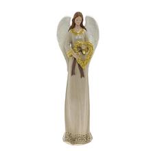 Krémový anděl se zlatým věncem.