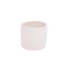 Keramický obal v bílé barvě s jemným vzorem.