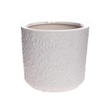Bílý květináč s vzorem vločky.