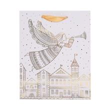 Vánoční taška s andělem nad městem.