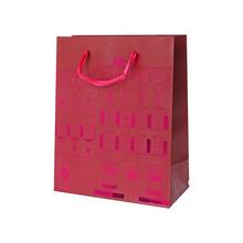 Vánoční papírová taška s motivem domečků.