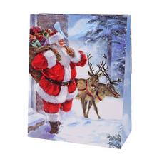 Velká vánoční taška s motivem Santa Clause a sobů.