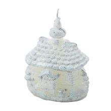 Bílý domek kostel se svíčkou