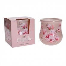 Vonná svíčka magnólie ve skleněném obalu.