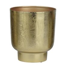 Květináč obal se vzorem listů ve zlaté barvě.