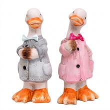 Keramické kachny v oblečení, bílá barva, mix designů.